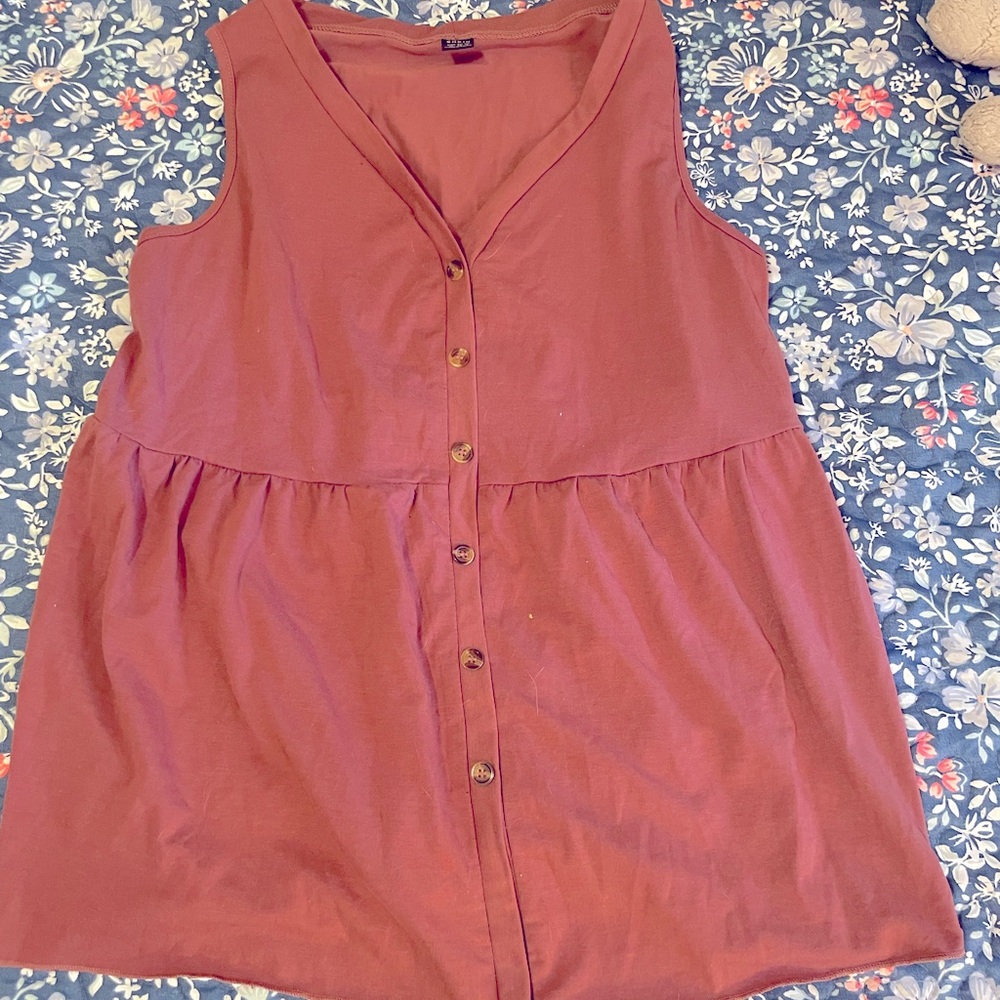 Pink button top.